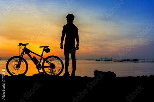 cyclist silhouette sunrise