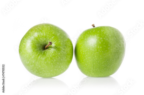 whole green apple isolated on white.