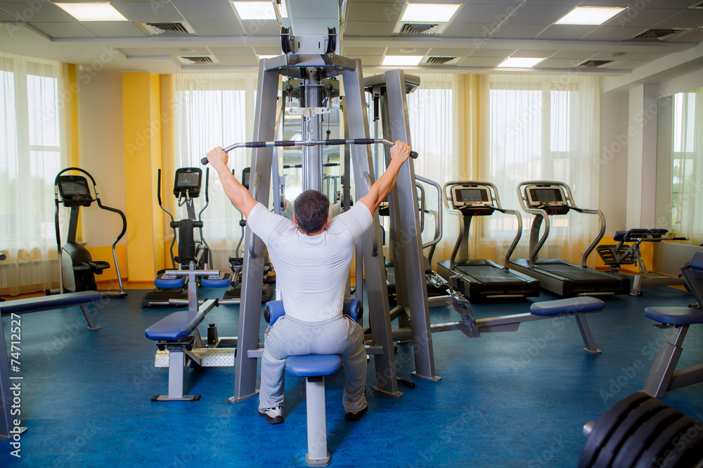 a man engaged in the gym a man engaged in the gym