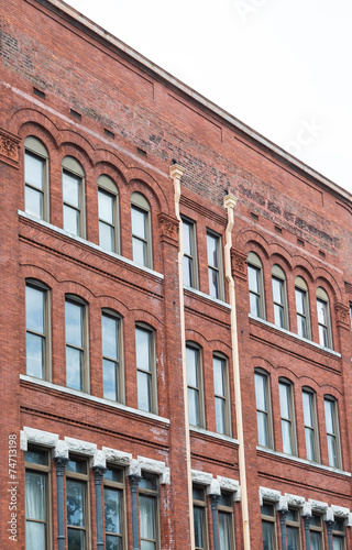 Old Red Brick Building in Savannah with many Windows