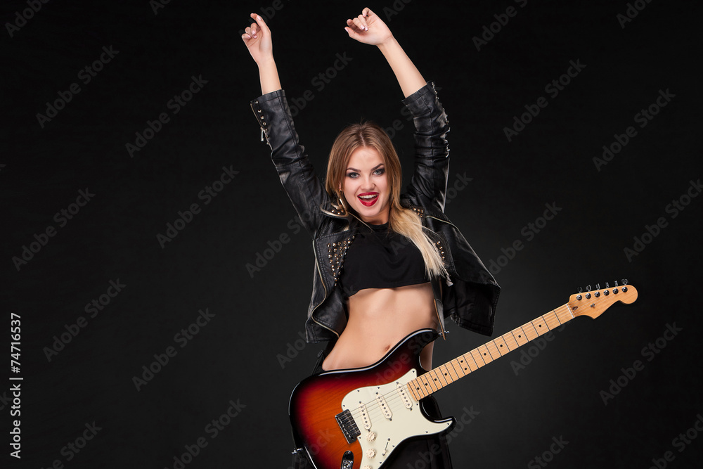 Beautiful girl playing guitar
