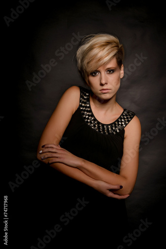 Wallpaper Mural Beautiful blonde with short hair on a dark background   Torontodigital.ca
