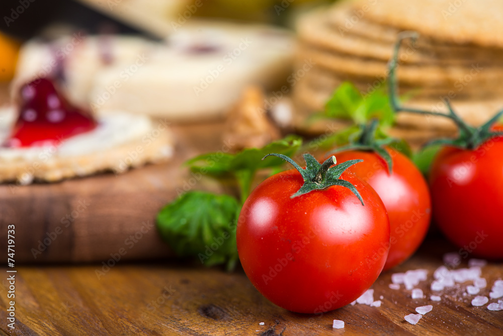 fresh organic tomatoes with basil and rock salt