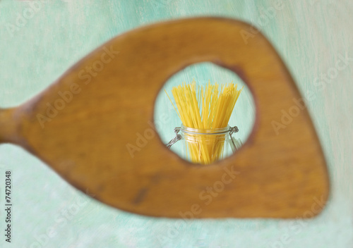spaghetti and a  wooden spoon free copy space