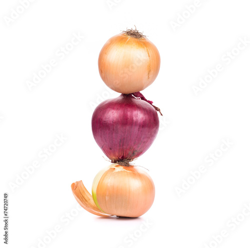 Ripe onions on white background.