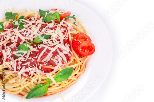 Spaghetti with tomato sauce basil and cheese.