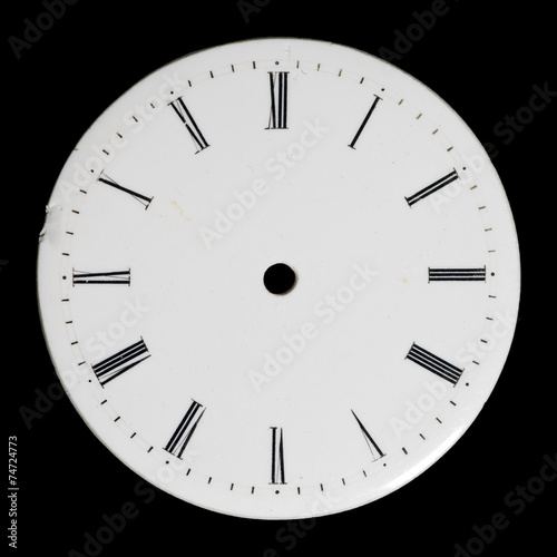 Antique, hand-painted, enamel watch face. Isolated on black.