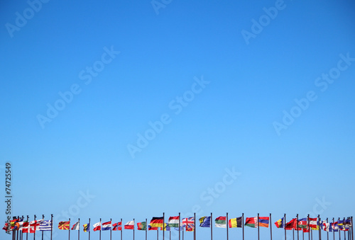 international flags against the sky