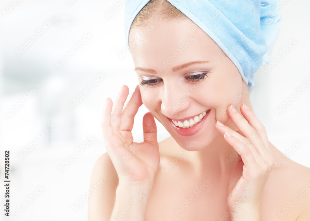 skin care. young beautiful healthy girl in towel in bathroom skin care. young beautiful healthy girl in towel in bathroom