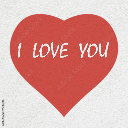 heart painting with i love you text on the white wall