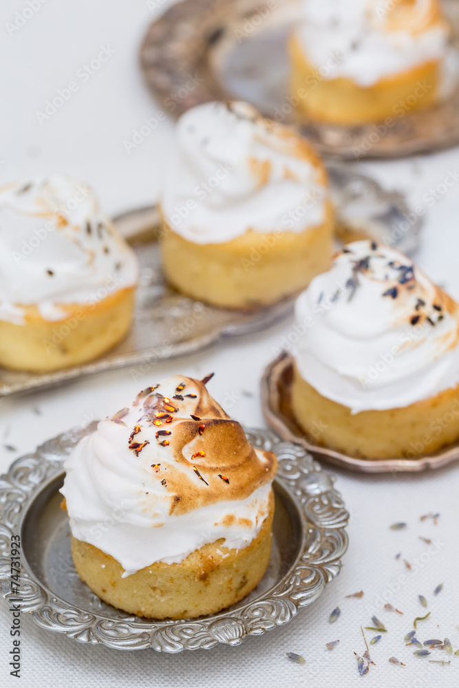 delicious cupcakes with white cream and lavender tea delicious cupcakes with white cream and lavender tea