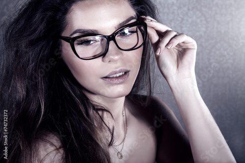 Attractive woman posing in eyeglasses