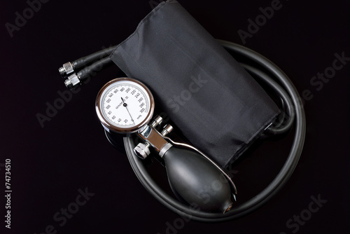 Professional sphygmomanometer isolated on black