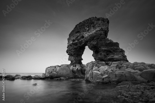 Rock arch on the coast of Tyne and Wear, UK. photo