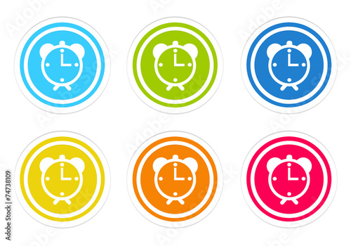 Set of rounded colorful buttons with alarm clock symbol