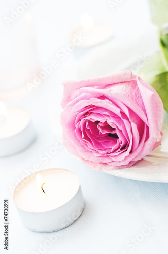 pink rose with candles