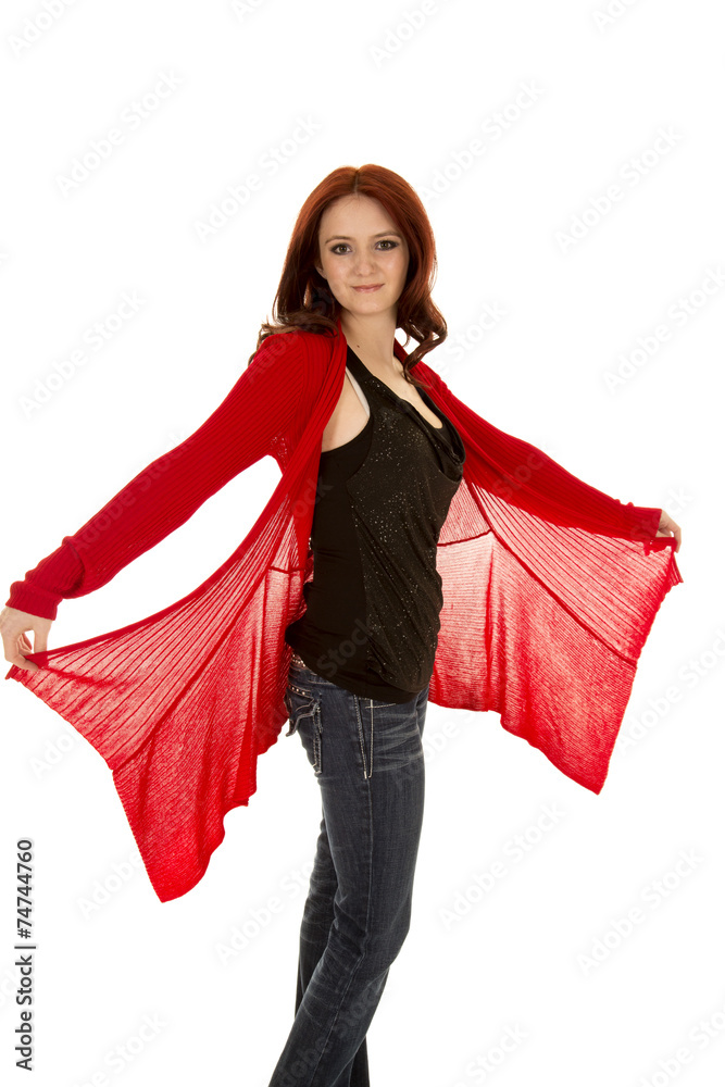 woman red hair stand red sweater hold out woman red hair stand red sweater hold out
