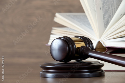 wooden gavel and books photo