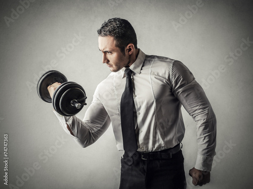 фотографія The strength of a businessman