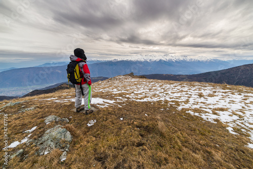 Hiker resting on the mountain top © fabio lamanna