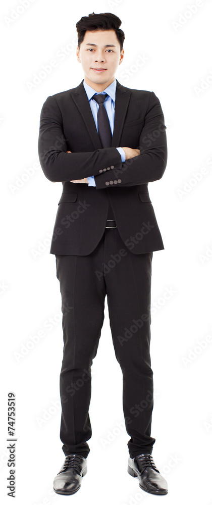 young businessman standing and isolated on white young businessman standing and isolated on white