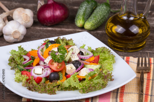 Fresh vegetable colorful greek salad in pate,