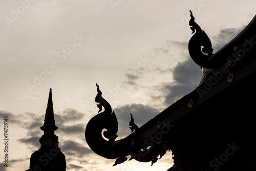 Roof and Pagoda of temple in Thailand photo