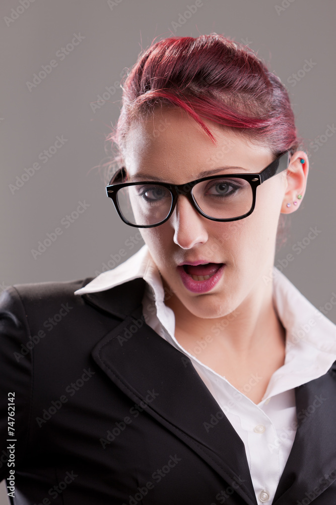 redhaired sexy eighties secretary with glasses