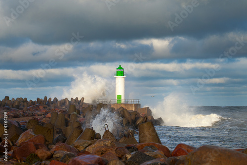 Breakwater in storm. photo