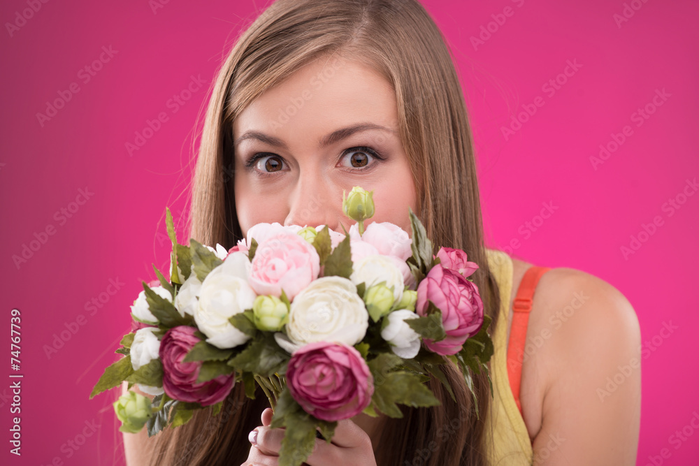 Beautiful girl on rose background