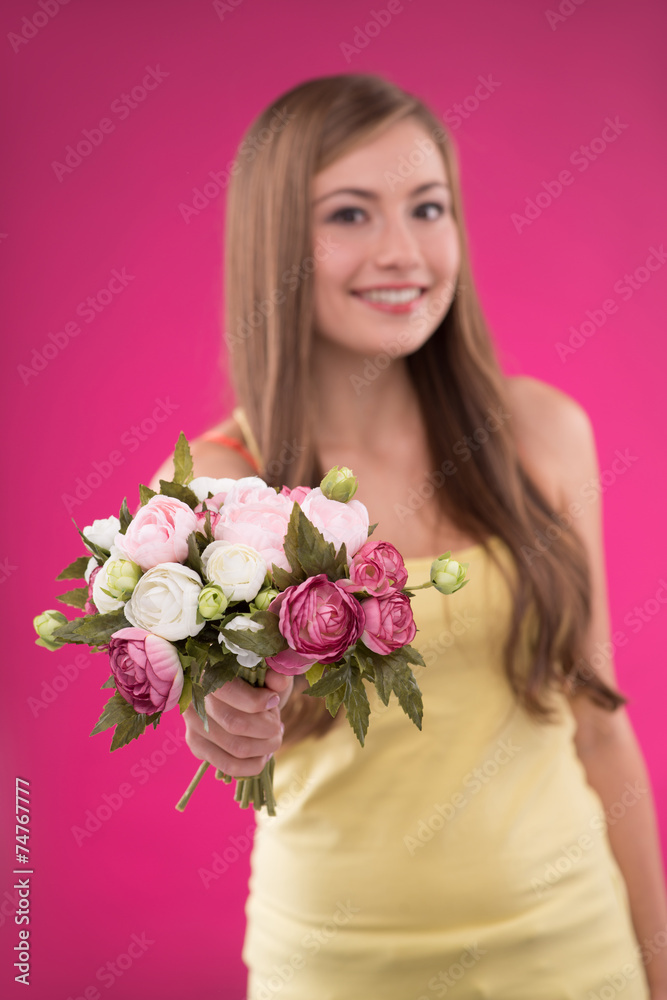 Beautiful girl on rose background
