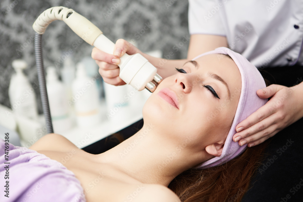 woman face treatment in medical spa center woman face treatment in medical spa center