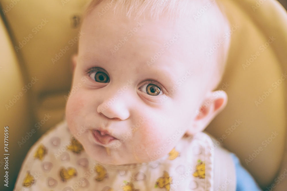 Happy Curious Young Baby Boy Eating Porridge Happy Curious Young Baby Boy Eating Porridge