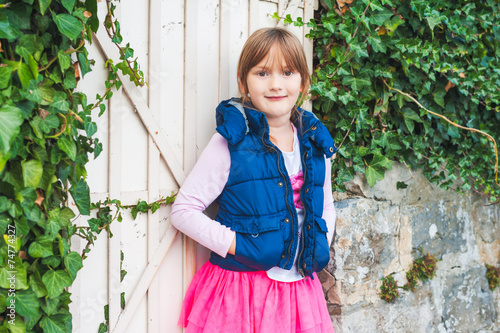 Outdoor portrait of a cute little girl