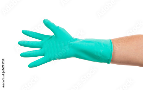 Hand in green glove.