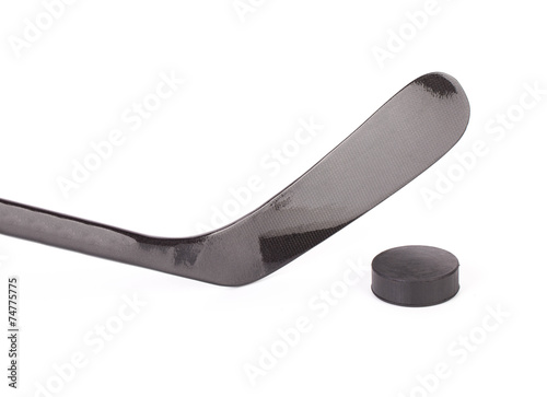 ice hockey stick and puck. photo