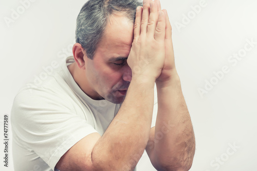 Man Praying With Hands Closed