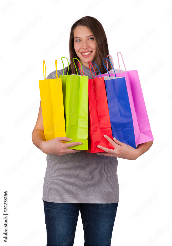 Young woman with shopping bags isolated on white background Young woman with shopping bags isolated on white background