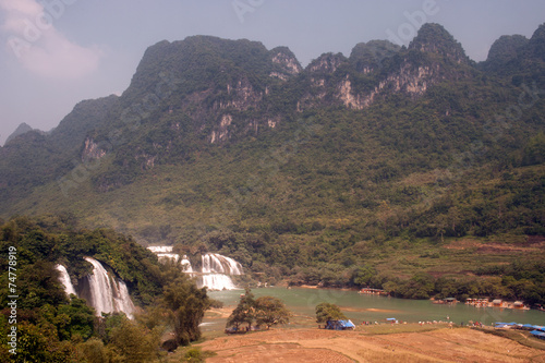 Ban Gioc waterfall in Vietnam and Datian waterfall in China. photo