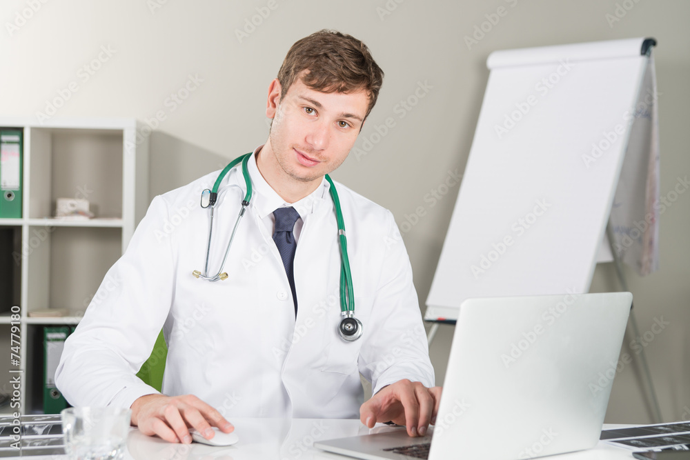 doctor at laptop