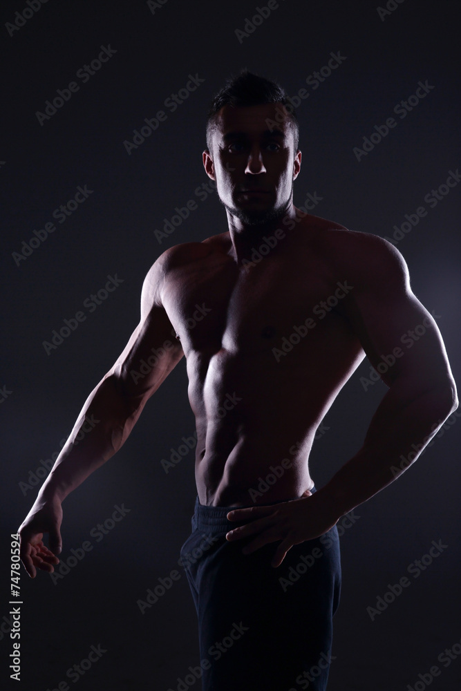 Silhouette of a muscular man