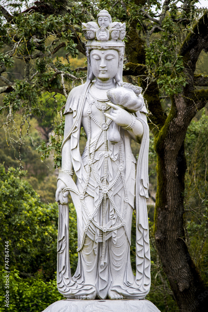 Close up view of a beautiful Buddha statue on a park. Close up view of a beautiful Buddha statue on a park.