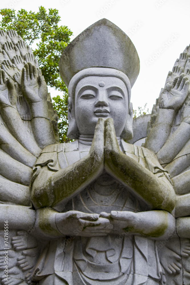 Close up view of a beautiful Buddha statue on a park. Close up view of a beautiful Buddha statue on a park.