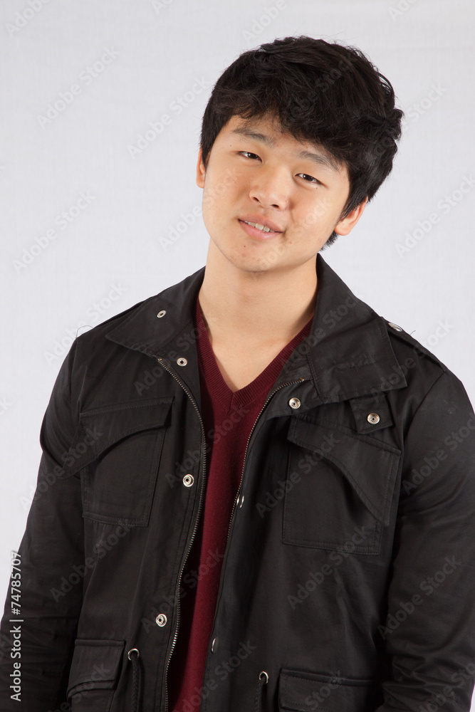 East Asian man smiling East Asian man smiling