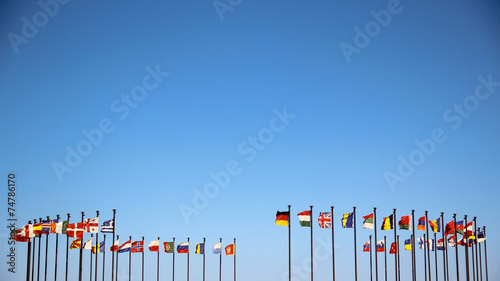 international flags against the sky