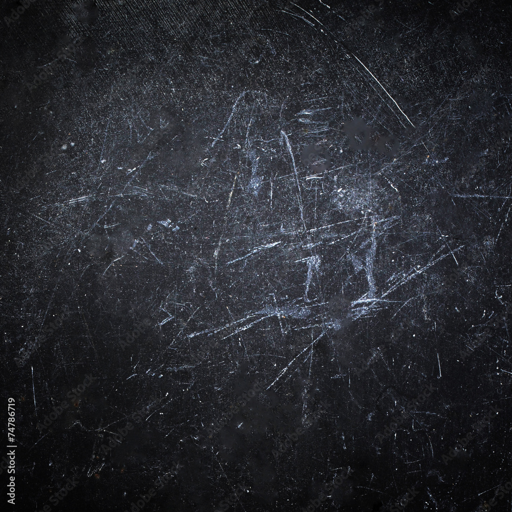 Abstract Black background with spotlight. Dark grunge textured w Abstract Black background with spotlight. Dark grunge textured w