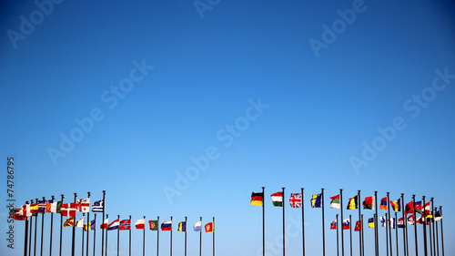 international flags against the sky