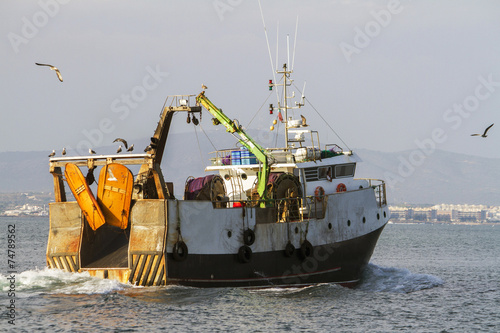  fishing ship exiting through Ria Formosa 