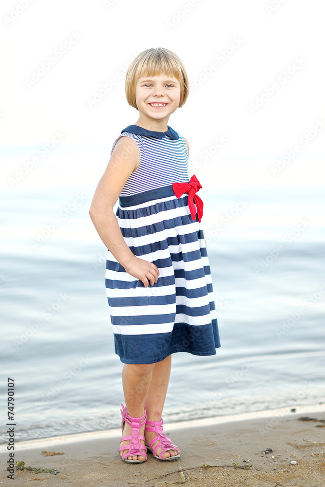portrait of little girl outdoors in summer portrait of little girl outdoors in summer