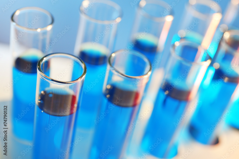 Test-tubes filled with blue and red fluid Test-tubes filled with blue and red fluid